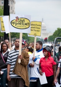 Protesting the decision by Barack Obama to cut funding to the D.C. Voucher program that helps mostly poor, African American children.